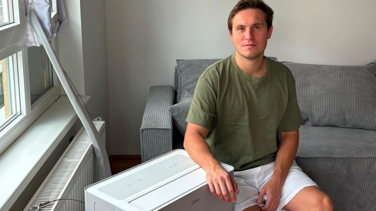 Image caption,Vienna resident Denis Yurchak bought a new Chinese air-conditioner during this heatwave