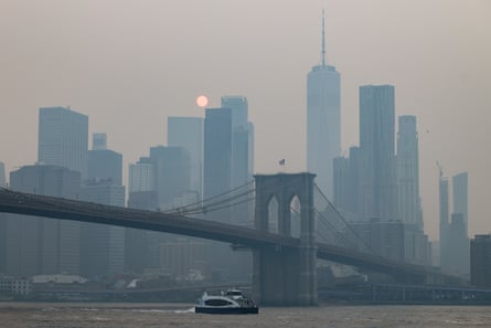 Wildfire smoke against the Manhattan skyline.Photograph: Christopher Neundorf/EPA