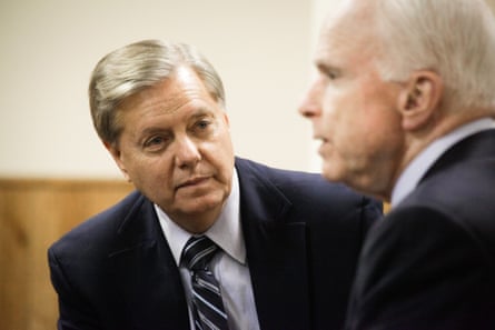 Then a Republican presidential candidate, Lindsey Graham conducts a media interview alongside Senator John McCain at American Legion Post 48 on 20 November 2015.Photograph: Luke William Pasley/Pacific Press/LightRocket via Getty Images