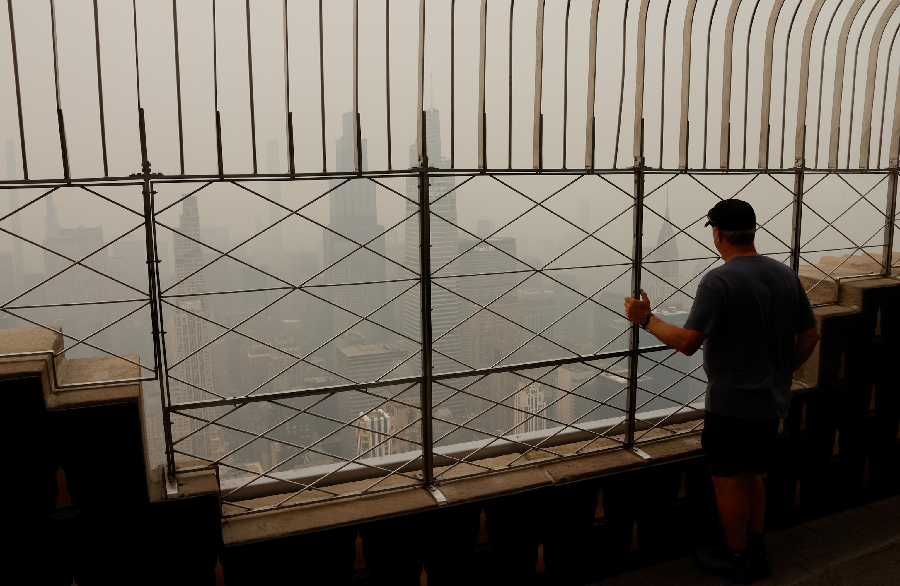 Wildfire smoke from Canada shrouds the sun as it rises behind the skyline of midtown Manhattan and, the Chrysler Building and the Empire State Building in New York City, July 17, 2026.Gary Hershorn/ABC News