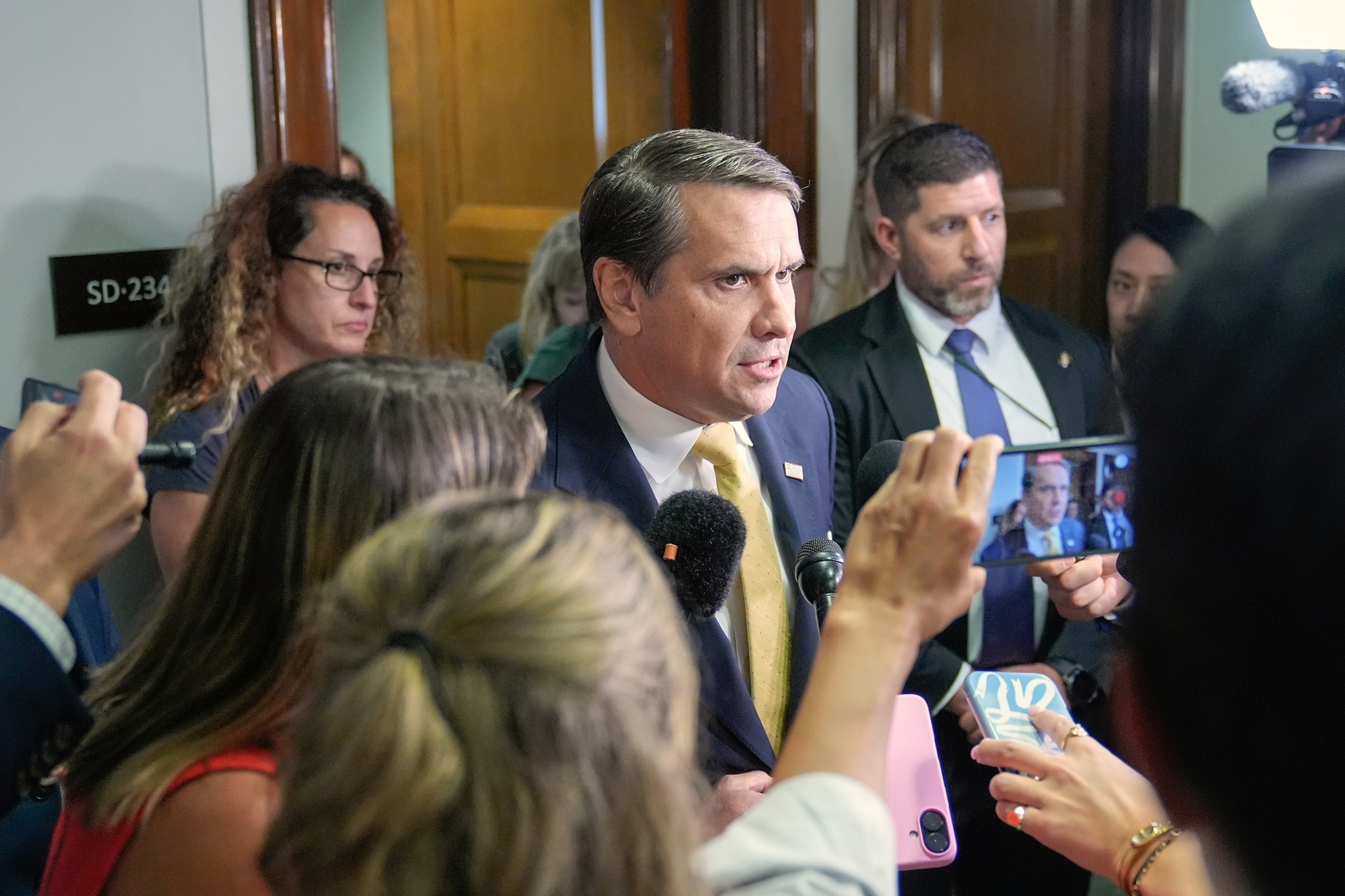 Acting Attorney General Todd Blanche talks with reporters after attending a meeting related to survivors of convicted sex offender Jeffrey Epstein in Washington, D.C., on Thursday, July 16, 2026.Mariam Zuhaib/AP Photo
