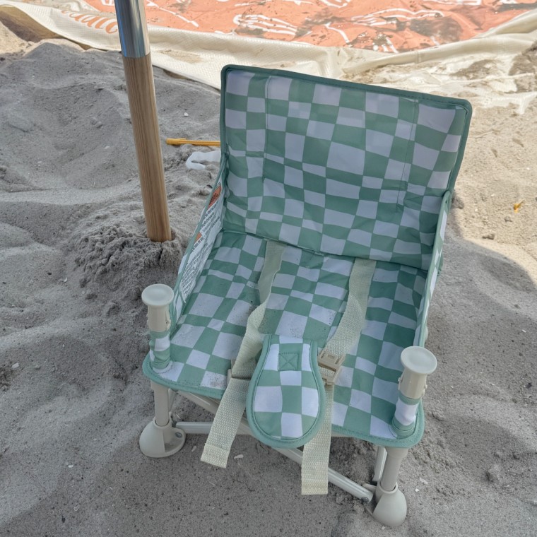 Izimini Booster chairs are cute and easy to set up, buckle for safety and come with a tray for meal time.Courtesy Becca Delman