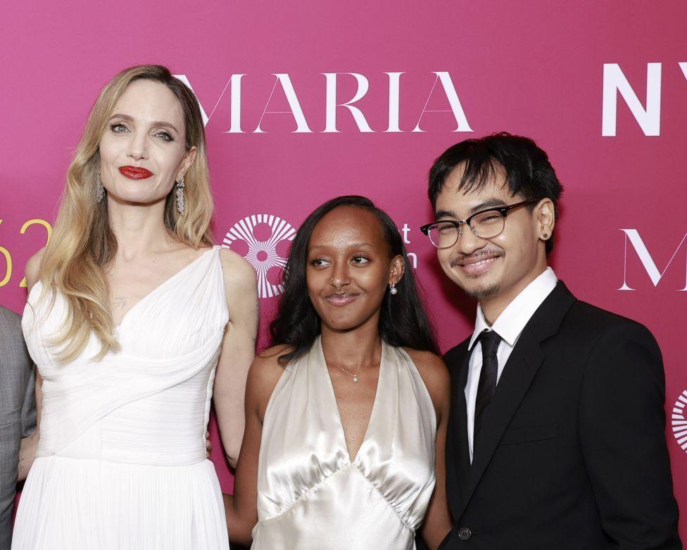 Image caption,Angelina Jolie with her children Zahara Marley Jolie-Pitt and Maddox Chivan Jolie-Pitt