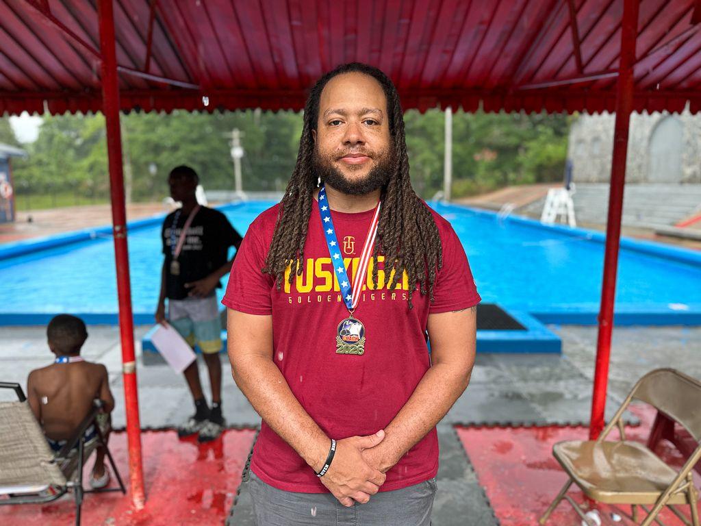 Image caption,Tuskegee Mayor Chris Lee, whom locals often refer to as "coach mayor", was awarded a medal by residents