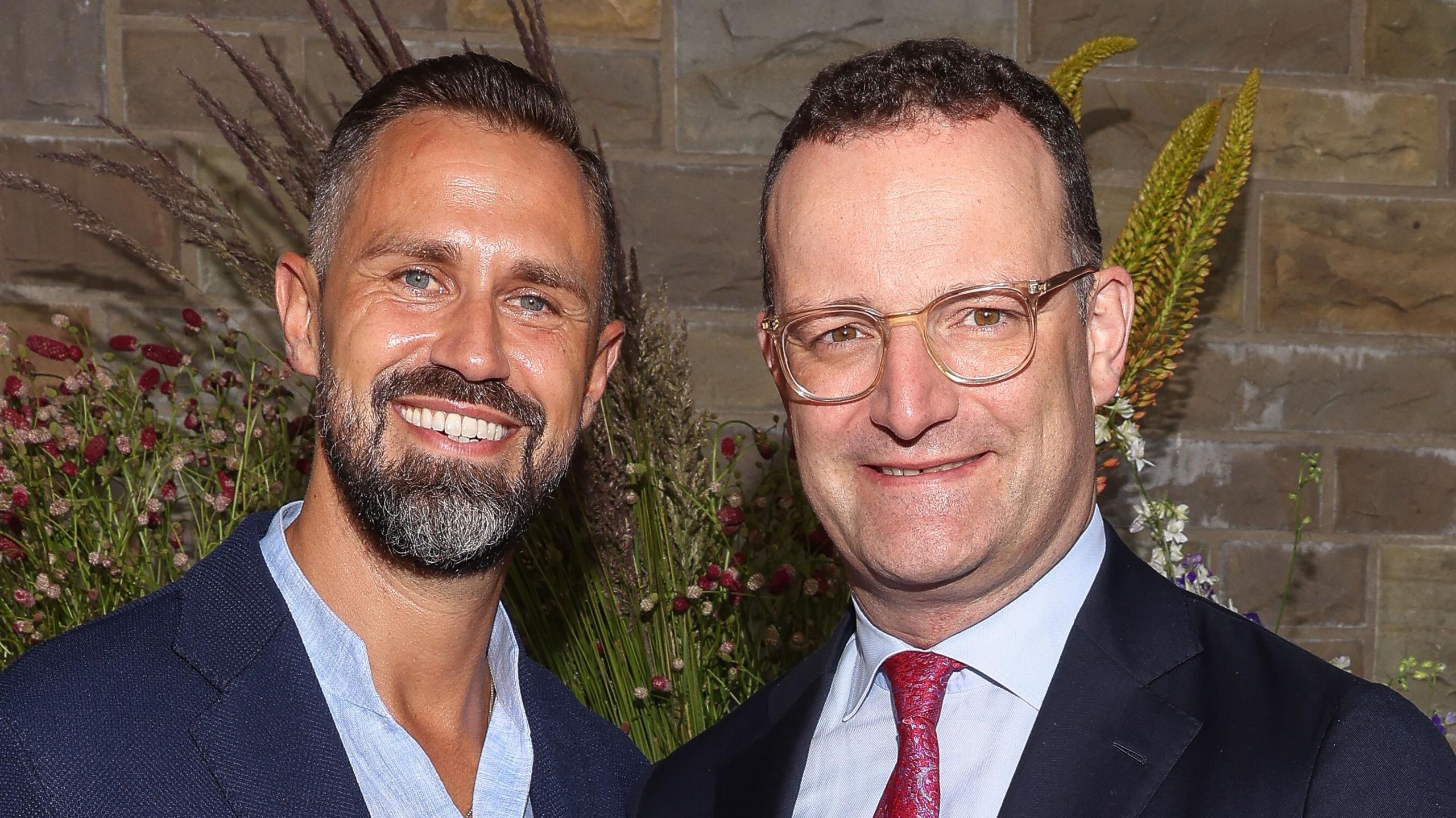 Image caption,Jens Spahn (R) was accused of double standards because he has opposed legalising surrogacy in the past