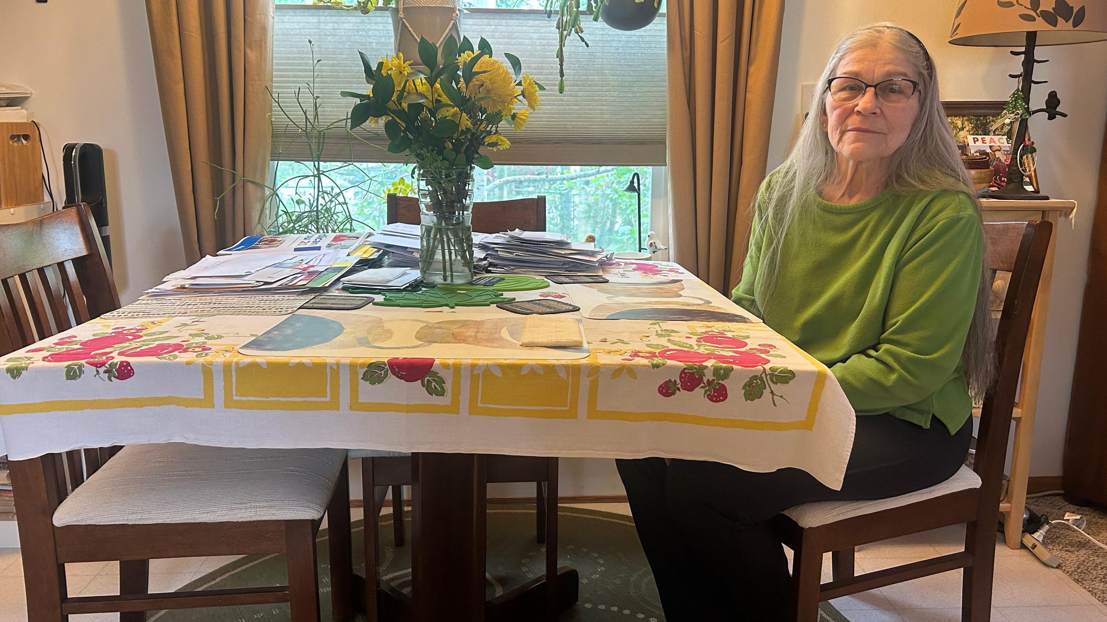 Image caption,Sara Folger, who works part-time at Montana's first Whole Foods, which opened in 2023, has lived in Mountain Meadows mobile home park for 17 years