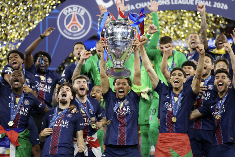 Members of Paris Saint-Germain celebrate their UEFA Champions League victory in the final match against Arsenal FC in Budapest earlier this year.Michael Regan / UEFA via Getty Images file