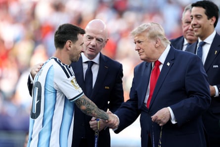 Lionel Messi receives his runner-up medal from Donald Trump.Photograph: Alex Pantling/FIFA/Getty Images