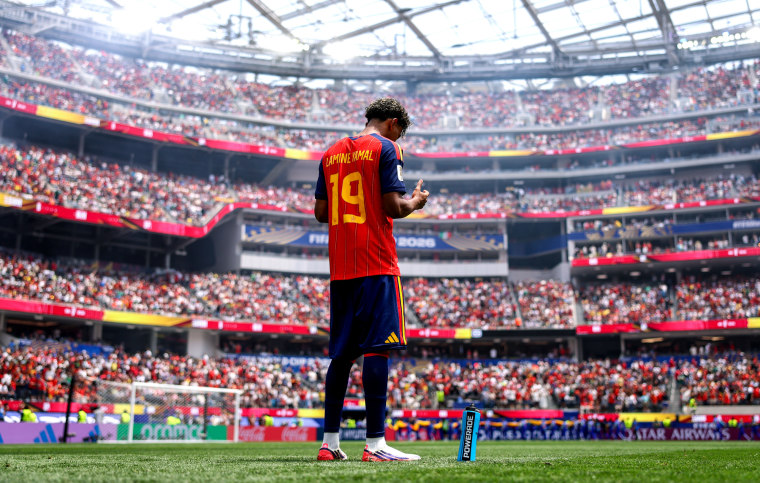 Lamine Yamal of Spain prays before his team's match against Belgium at Los Angeles Stadium.Alex Pantling / FIFA via Getty Images