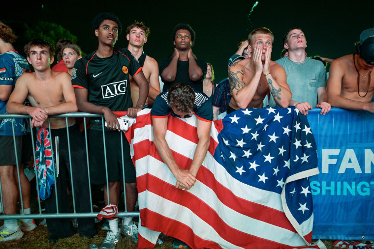Fans watch as the United States loses to Belgium at a FIFA Fan Zone on the National Mall in Washington.Rod Lamkey / AP