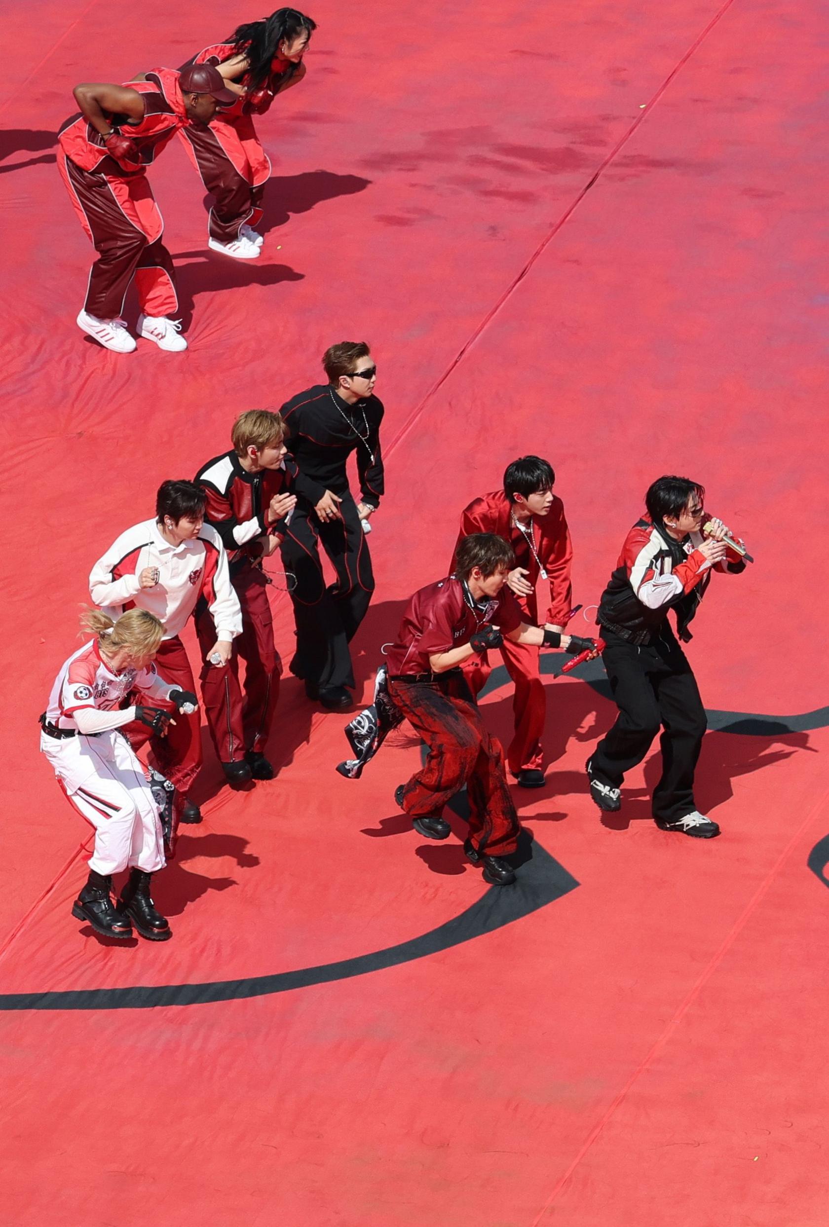 Image caption,The stadium was a riot of colour for the half-time show, with fireworks ringing the stadium