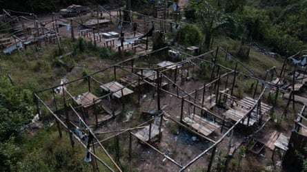 The wreckage of the destroyed bordello in Vila Cururu.Photograph: João Laet/The Guardian