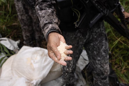 Ammonium nitrate explosives found in the undergrowth near Vila Cururu.Photograph: João Laet/The Guardian