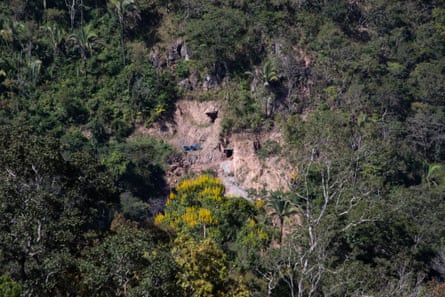 The entrances of tunnels dug by illegal miners.Photograph: João Laet/The Guardian