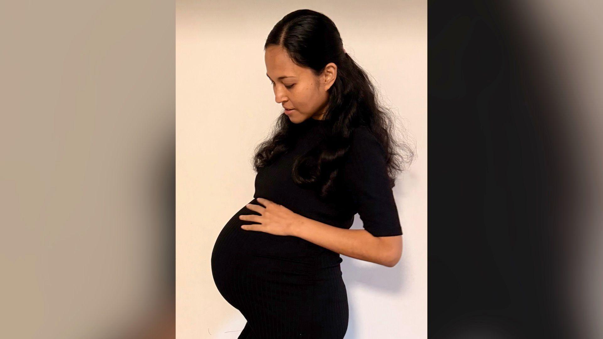 Image caption,Jenitar Na'amoana said her and her husband's hearts were "overflowing with gratitude" after the births