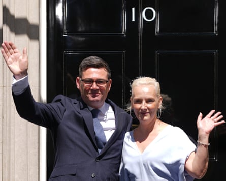 Andy Burnham and his wife, Marie-France van Heel, outside No 10.Photograph: Kirsty Wigglesworth/AP