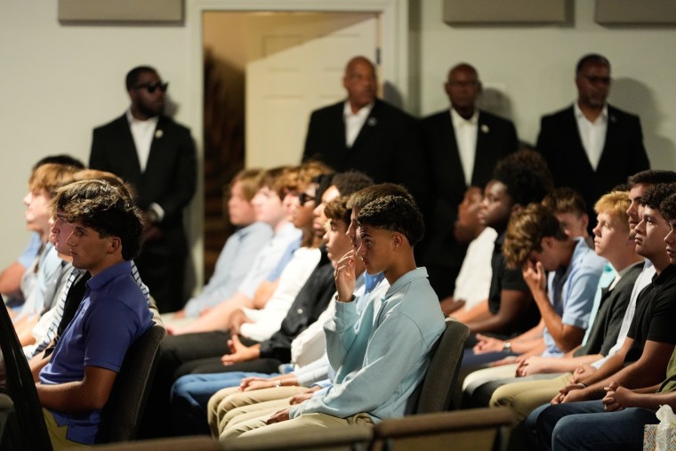 Football teammates attend the memorial service.Gerald Herbert / AP