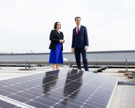 Ed Miliband and Bridget Phillipson take a look at a solar installation on the roof of a school in Sheffield.Photograph: Zara Farrar/DESNZ