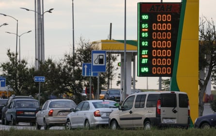 Cars queuing for fuel in Yevpatoria.Photograph: Alexey Pavlishak/Reuters