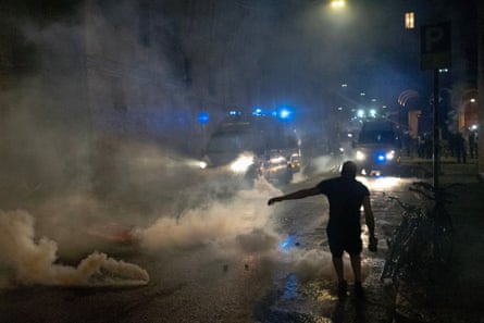 Teargas being used by police in central Bologna.Photograph: Thomas Cavagna/JNA/ZUMA Press Wire/Shutterstock