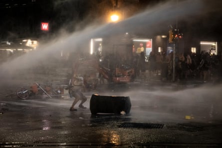 Water cannon being used on protesters on Monday night.Photograph: Max Cavallari/EPA