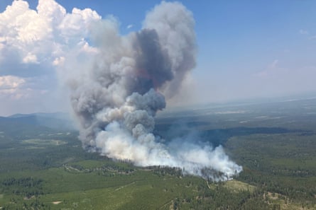 Smoke rising from the Fiftynine Creek wildfire in British Columbia.Photograph: BC Wildfire Service/Reuters