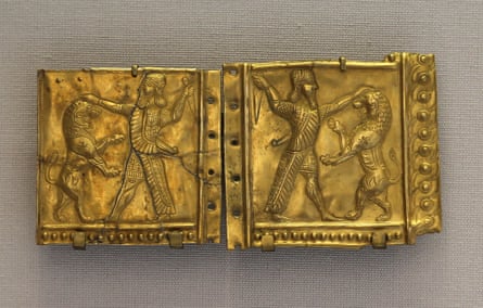 A gold plate from the Ziwiye hoard showing a character fighting a lion. The object, which dates back to 700BC, is in the Louvre in Paris.Photograph: Lanmas/Alamy