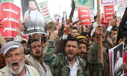 Yemenis take to the streets in Sana’a to protest against Saudi Arabia’s military action in north Yemen.Photograph: Mohammed Hamoud/Getty Images