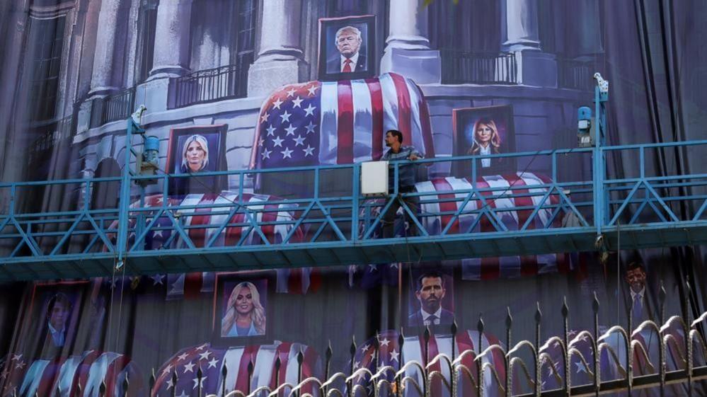Image caption,An anti-US billboard in the Iranian capital Tehran
