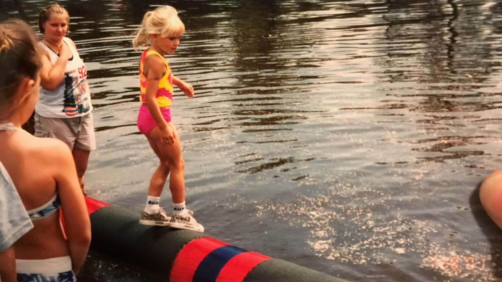 Image caption,Hayward native Meredith Ingbretson, pictured as a child, first got involved in logrolling when she was three