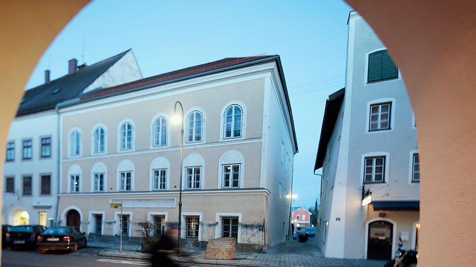Image caption,The old yellow-plastered house has since been substantially refurbished so the facade looks very different