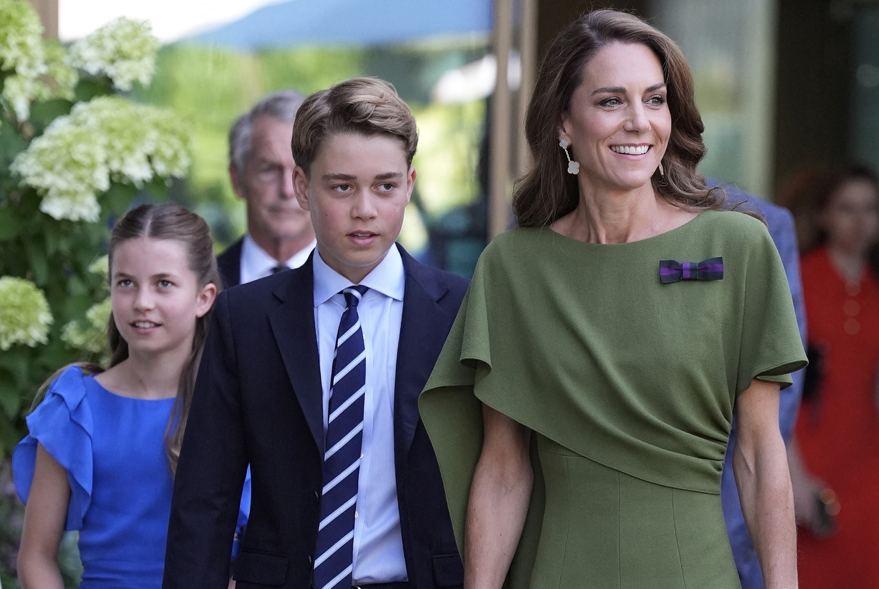 Britain's Catherine, Princess of Wales, Prince George of Wales and Britain's Princess Charlotte of Wales arrive to attend the men's singles final at the Wimbledon tennis championships in London, July 12, 2026.Andrew Matthews/Pool/AFP via Getty Images