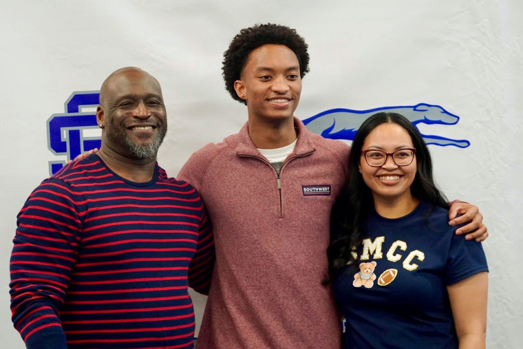 Nolan Wells with his parents.Courtesy Wells family