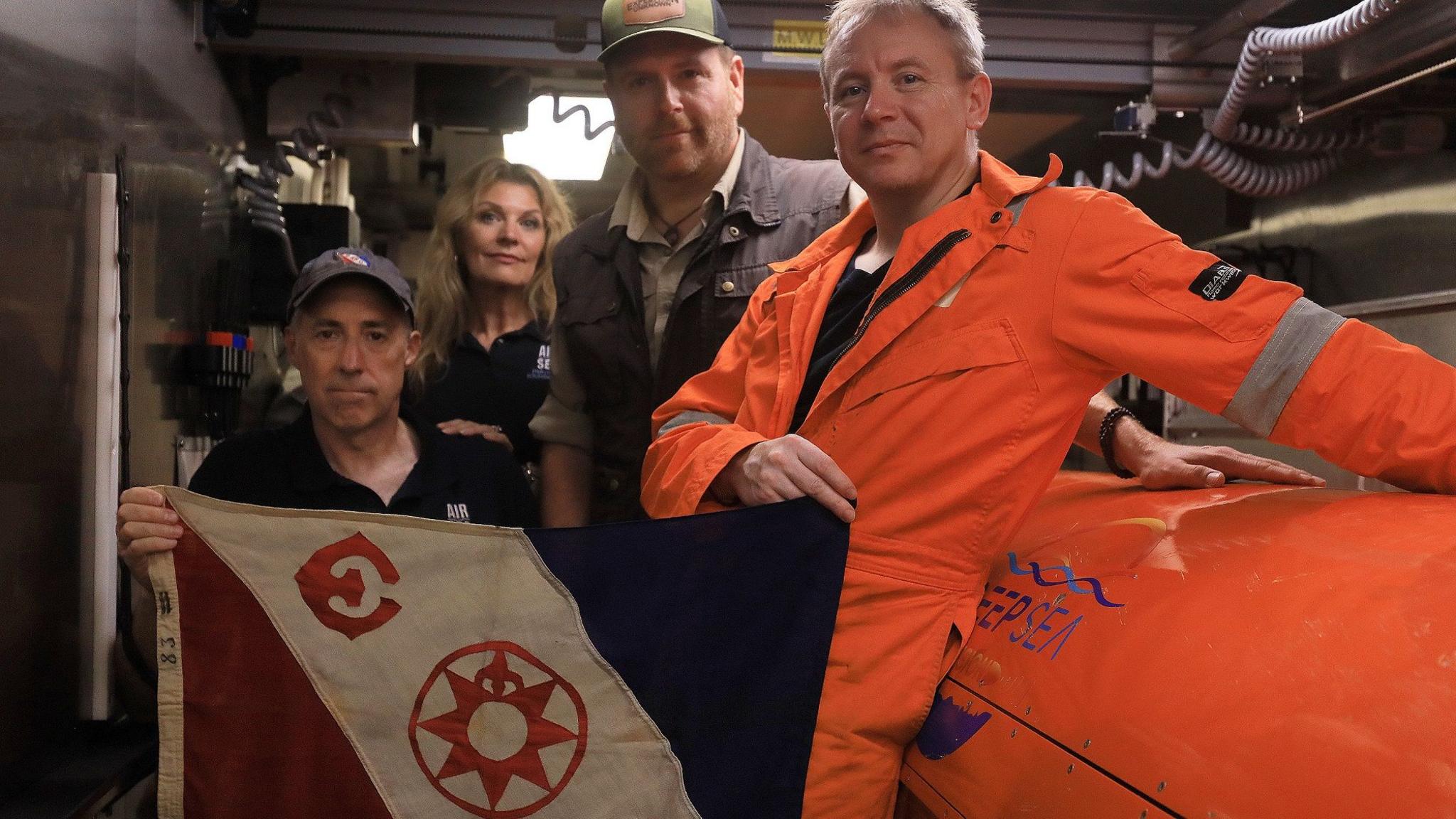 Image caption,Russ Matthews (left) said he had been determined to find the wreckage before the 75th anniversary of the crash