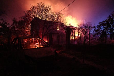 A house is engufled in flames in Cotignac, southeastern France.Photograph: Thibaud Moritz/AFP/Getty Images