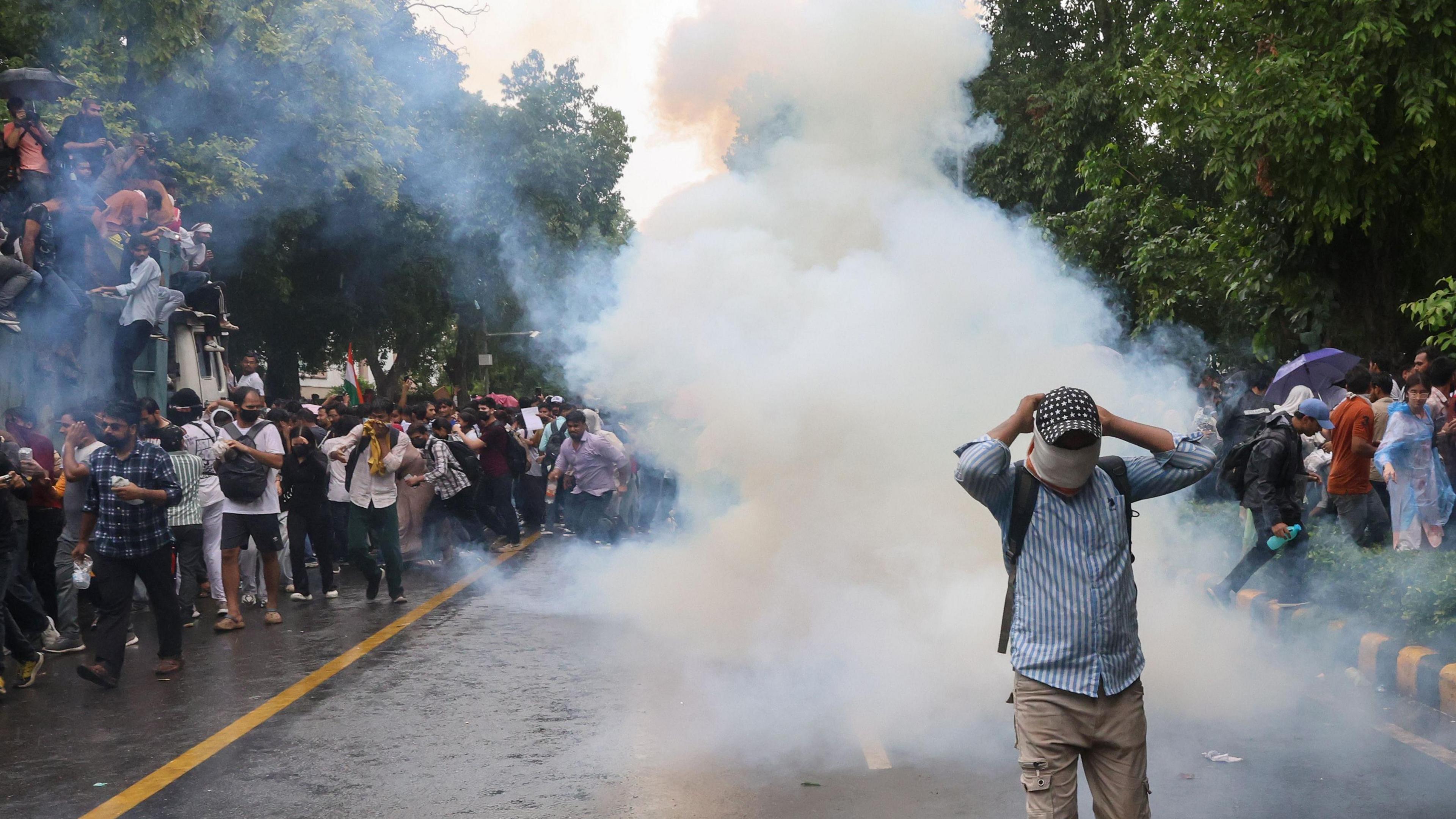 Image caption,Police fired tear gas to disperse protesters as they tried to reach parliament