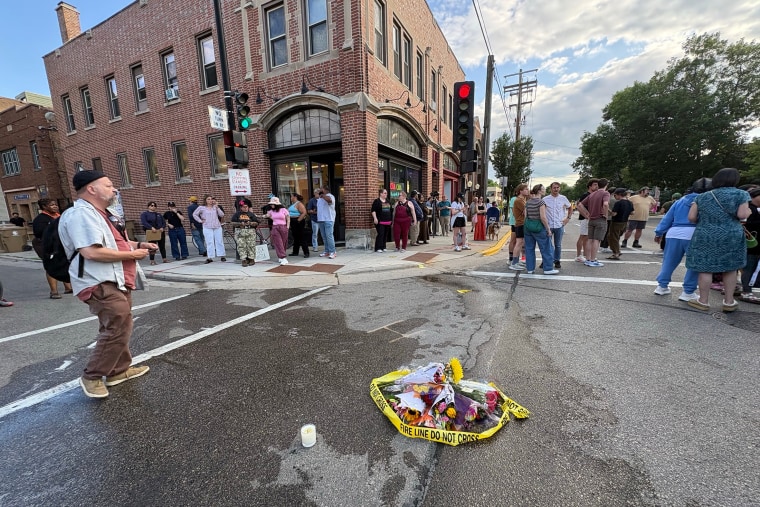 People gather at the scene of the police shooting on Madison's Williamson Street on Wednesday.Laura Schulte / Milwaukee Journal / USA TODAY / Reuters