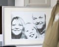 A framed photograph of Rosheski and Helen with their daughter.Photograph: Joel Goodman/The Guardian