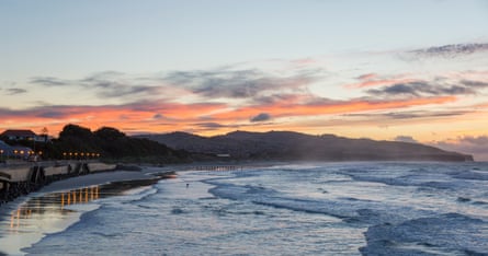 View at dawn along St Clair Beach, Dunedin. A total eclipse will be seen for the first time by humans across a band of southern New Zealand.Photograph: David C Tomlinson/Getty Images