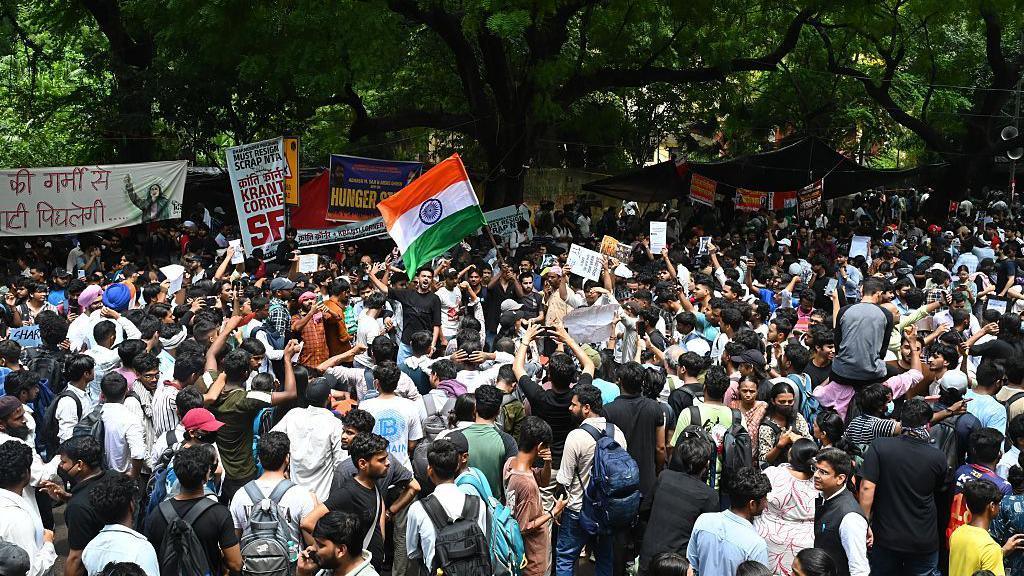 Image caption,Huge crowds continue to gather around the protest site in Delhi
