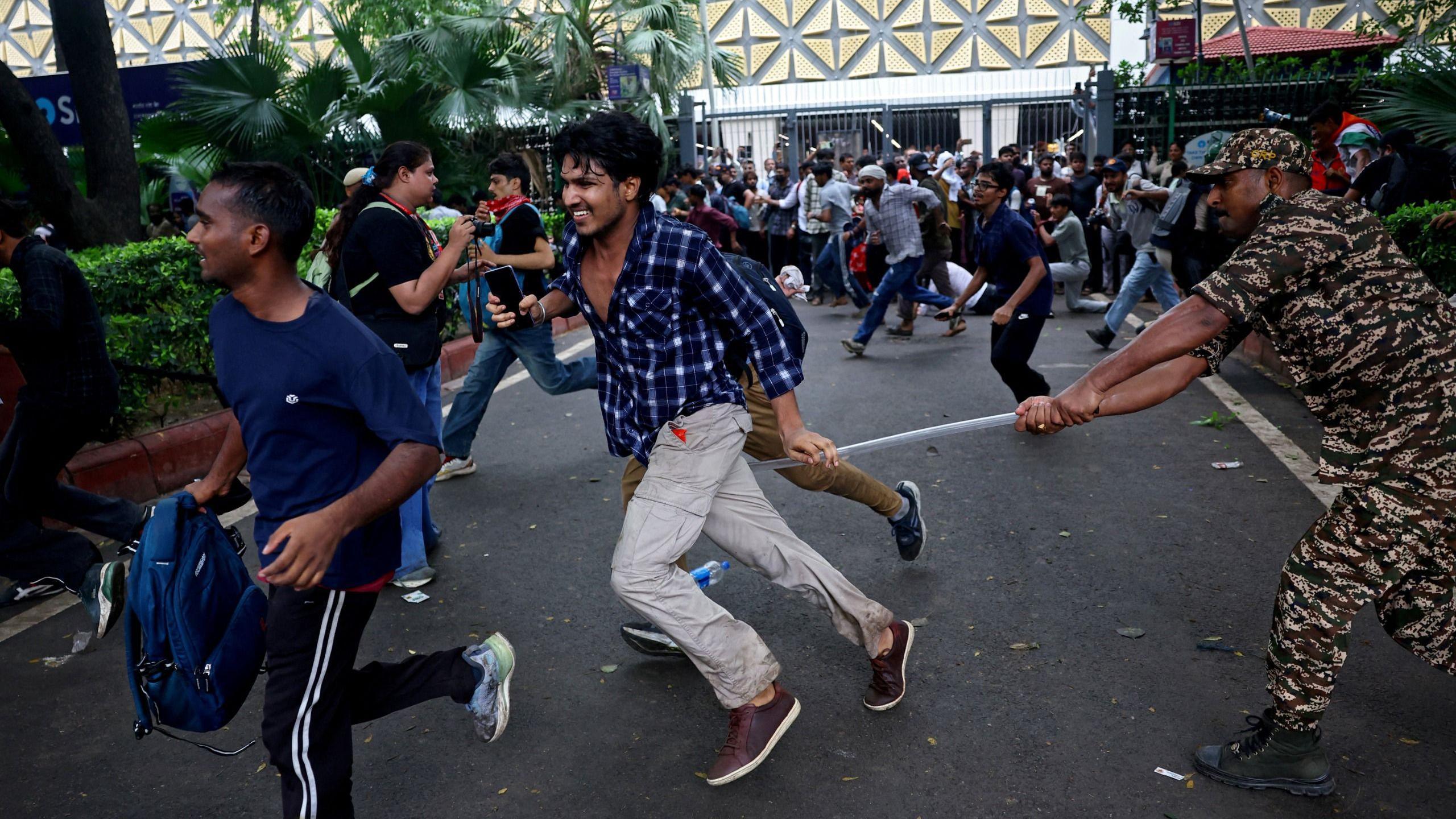 Image caption,Police charged at protesters with batons and tear gas during the 20 July march