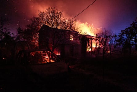 A house in Cotignac, another village close to Pontevès, is consumed by fire on Wednesday night.Photograph: Thibaud Moritz/AFP/Getty Images