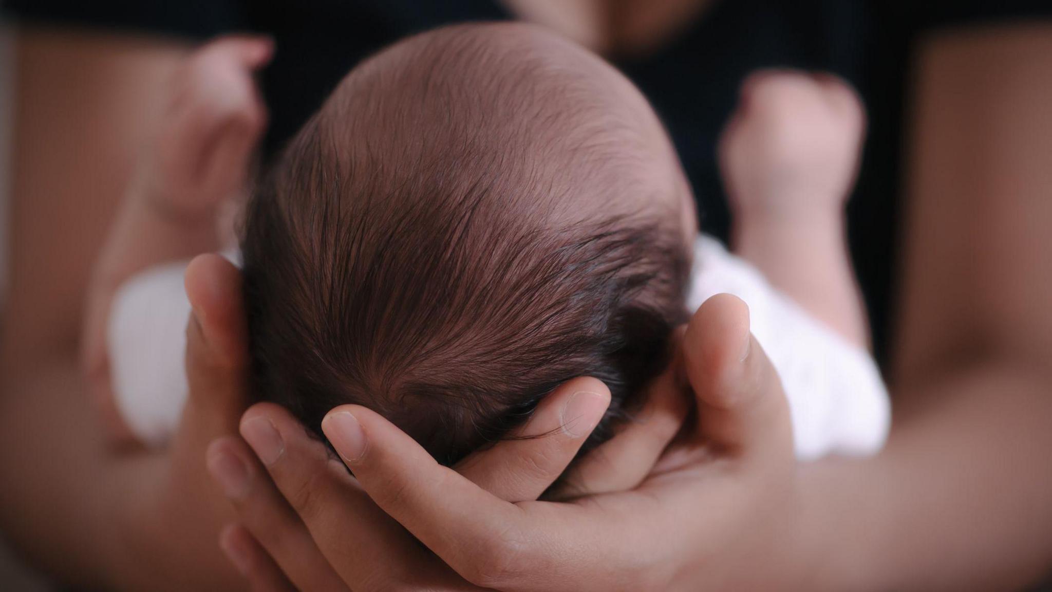 Image caption,At least 12 babies are believed to be in Singapore already (file picture)