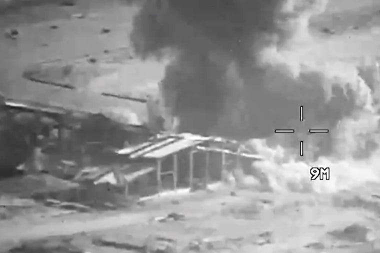 Smoke rises from an explosion at an unknown location, during U.S. strikes on Iranian military targets, in this screengrab taken from a Central Command video released Thursday.U.S. Central Command / via X