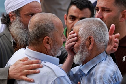 Family members of one of the four Palestinians who died in the clashes mourn outside a hospital in Nablus, in the occupied West Bank.Photograph: Jaafar Ashtiyeh/AFP/Getty