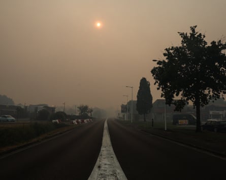 Wildfire smoke shrouds the sky over Biscarrosse in an ash-grey haze.Photograph: Romain Perrocheau/AFP/Getty Images