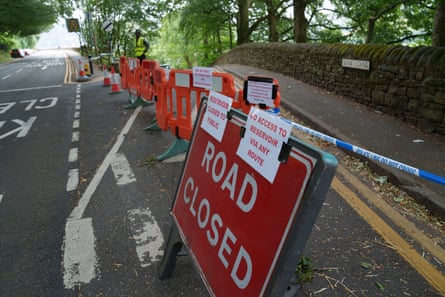 A closed road in Greenfield near Manchester due to a moorland fire.Photograph: Jon Super/AP