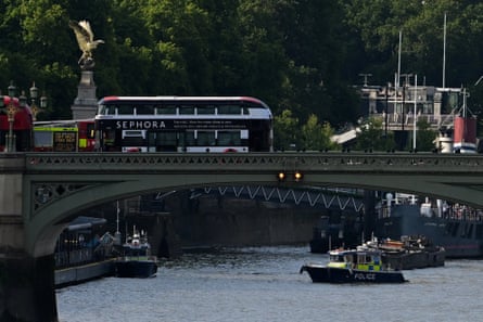 Police officers, fire crews and ambulances attended the scene, along with a police helicopter and air ambulance.Photograph: Jaimi Joy/Reuters