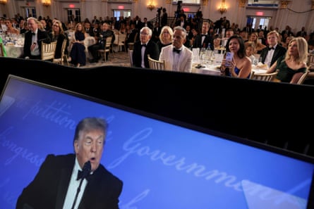 The room of journalists watches as Donald Trump delivers his speech.Photograph: Jonathan Ernst/Reuters