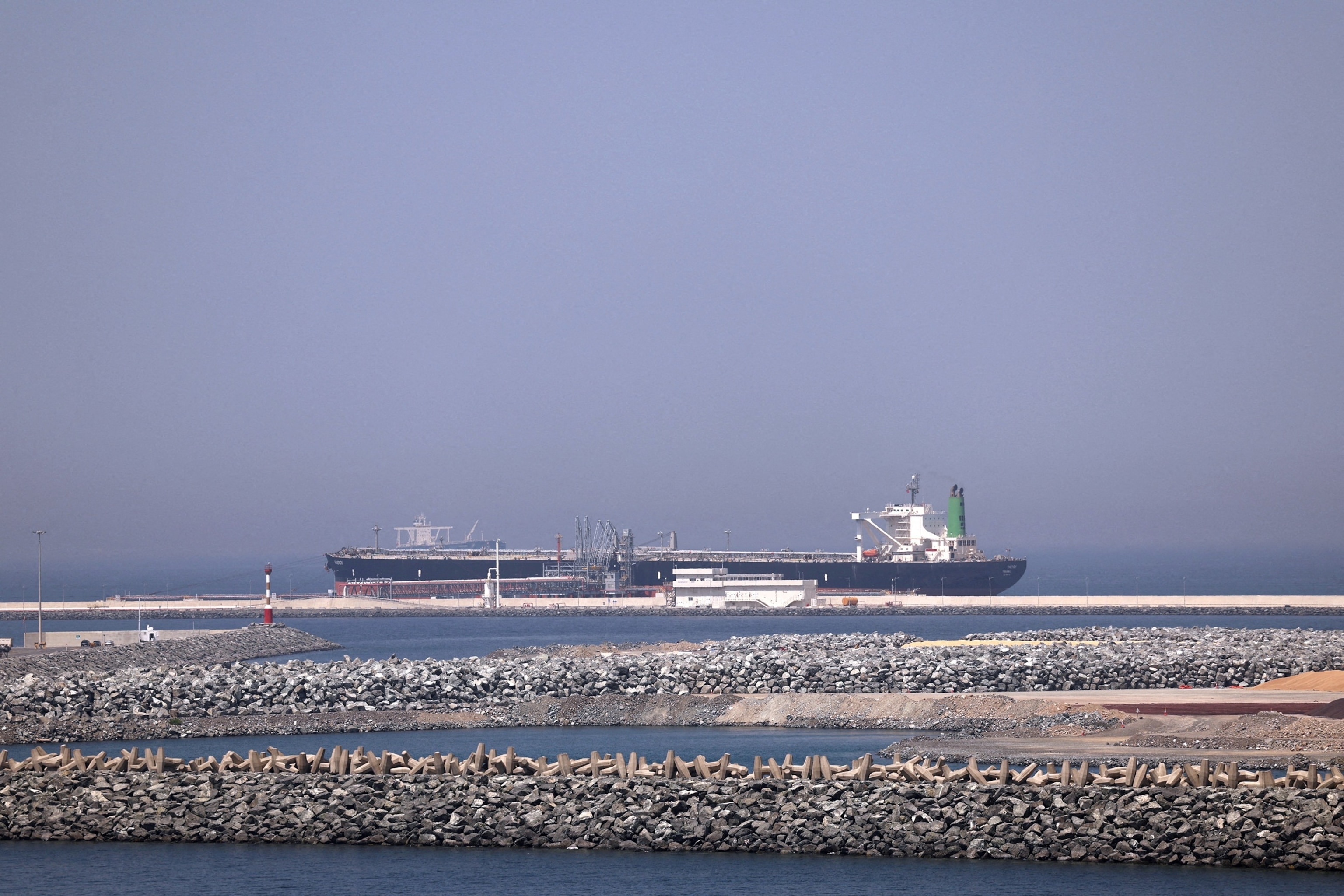 In this May 6, 2026, file photo, a cargo ship is docked at the Port of Fujairah, in Fujairah, United Arab Emirates.Amr Alfiky/Reuters, FILE